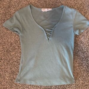 XS light teal shirt